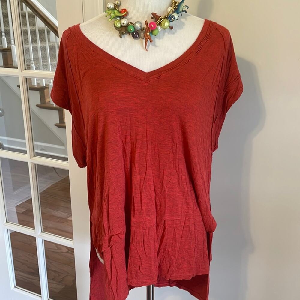 Women’s Free People Oversized Rustic top! High/low back. Size medium.